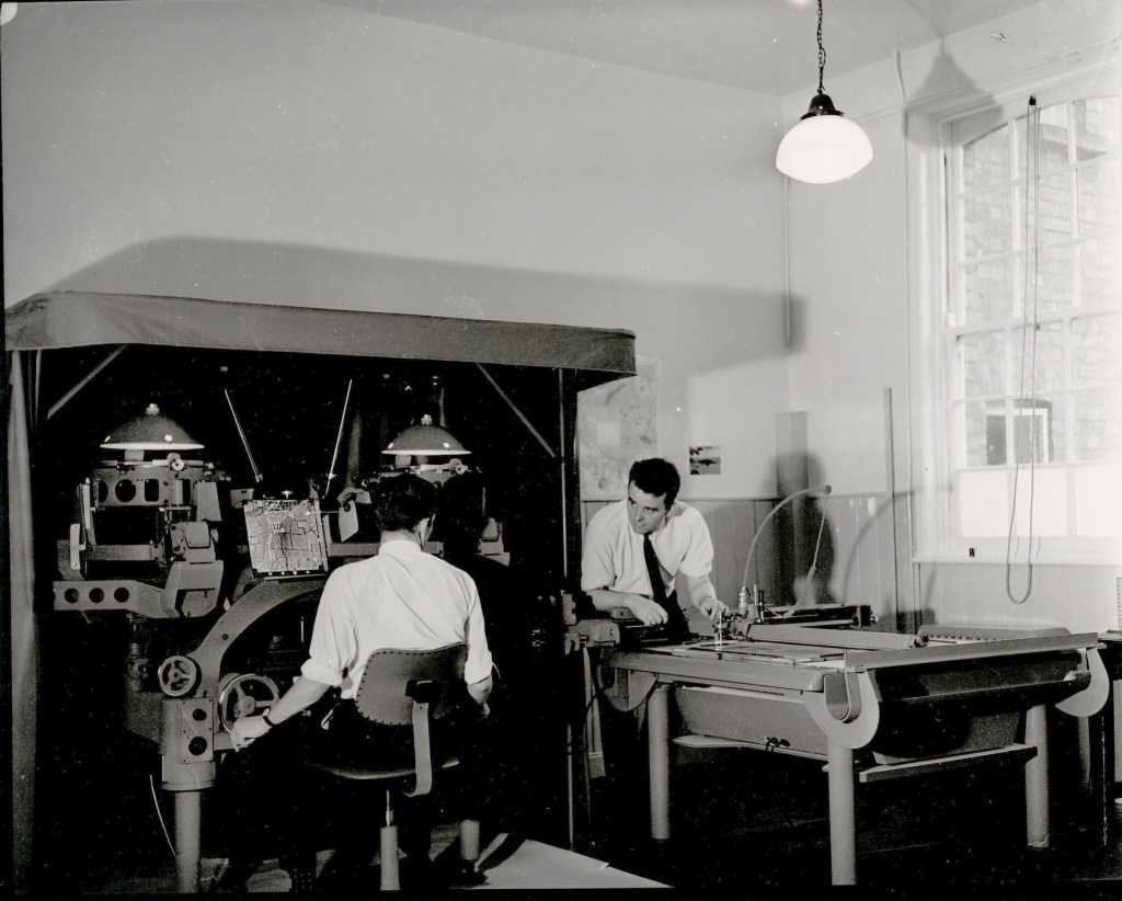 Surveying staff using a plotting instrument 1965